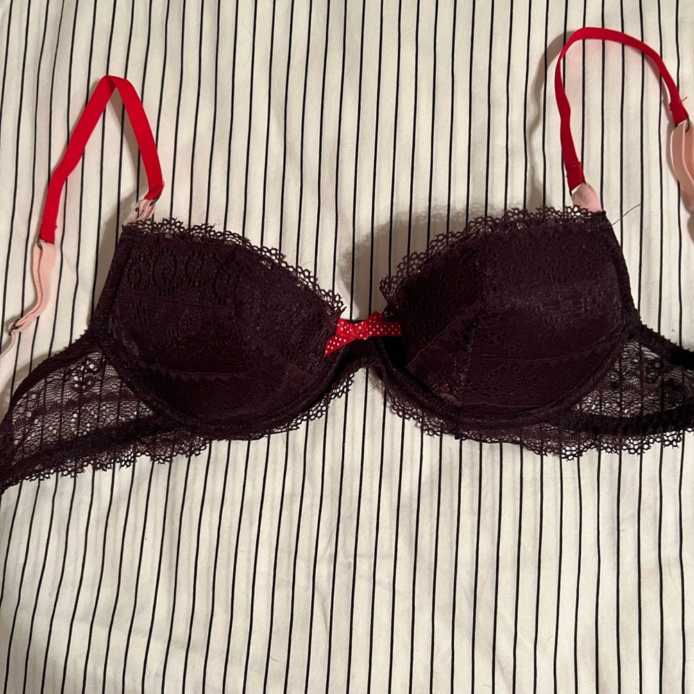 Vintage Victoria’s Secret lightly lined dark purple lace bra, size 34B